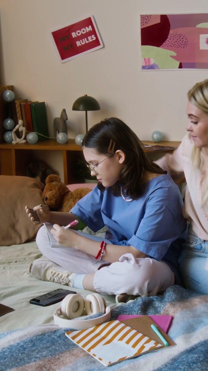 Mother and Daughter Study with Prosthetic Arm
