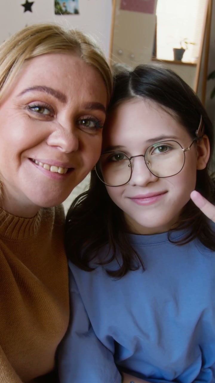 Mother and Daughter Taking a Selfie