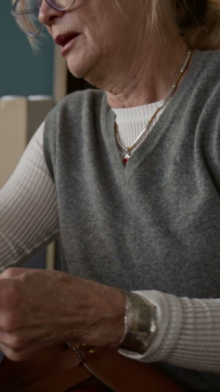 Mature Woman in Visa Center Appointment