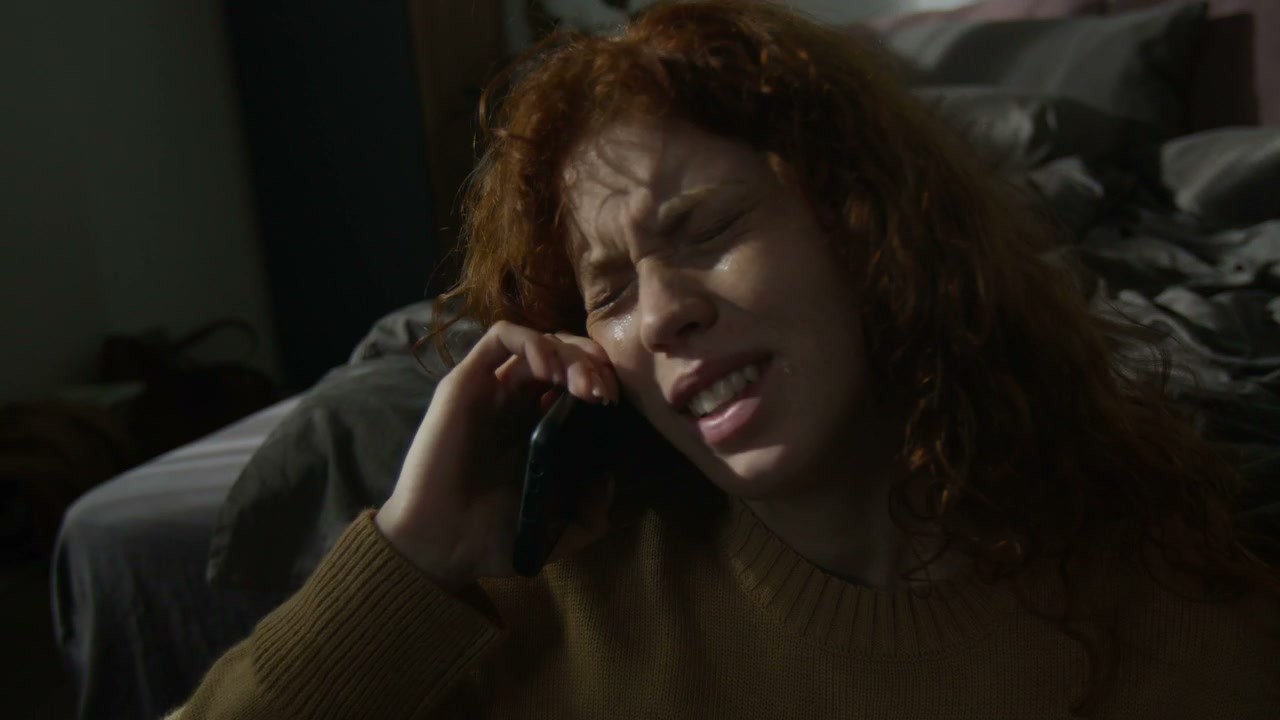 Distressed Woman on Emotional Phone Call