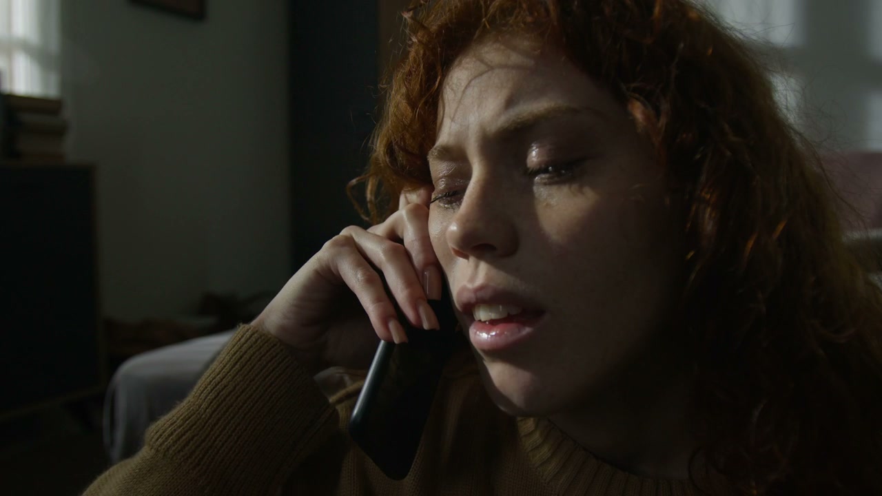 Distressed Woman on Phone Call