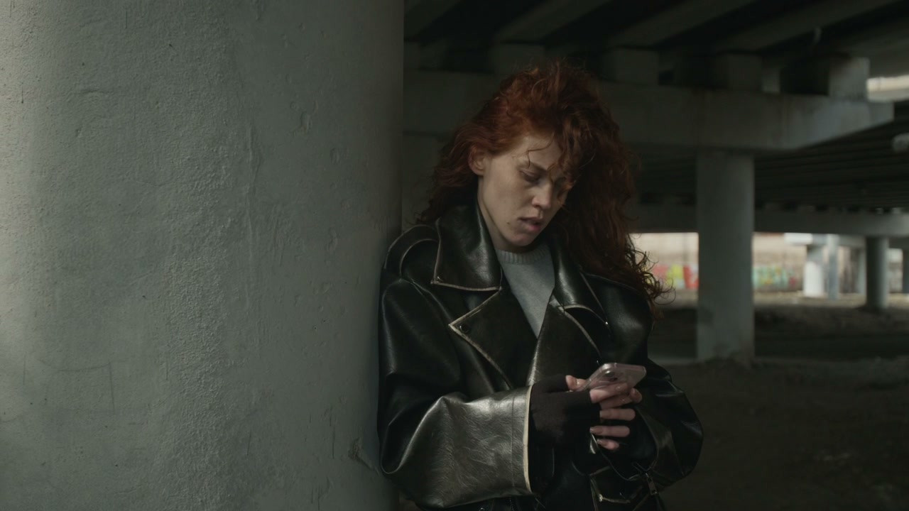 Distressed Woman On Phone Underpass