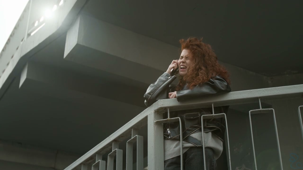 Redhead Woman Crying While Talking on Phone