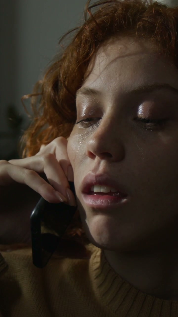 Distressed Woman on Phone
