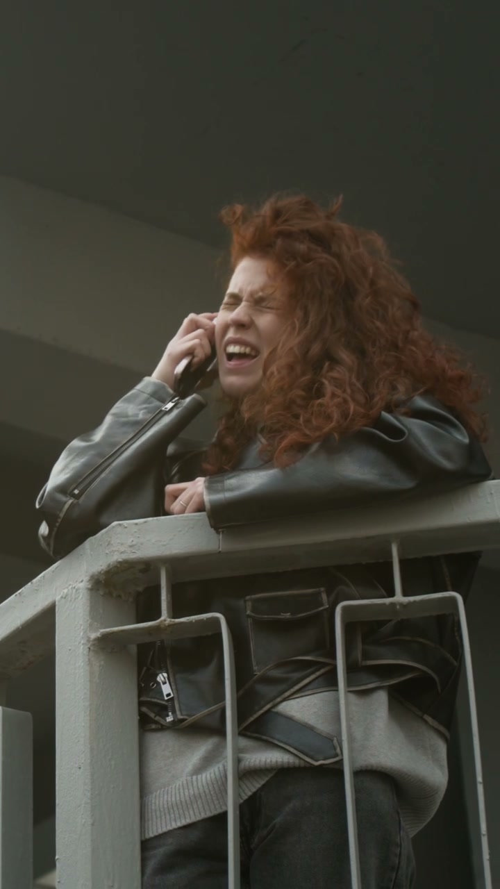 Woman Crying After Phone Call