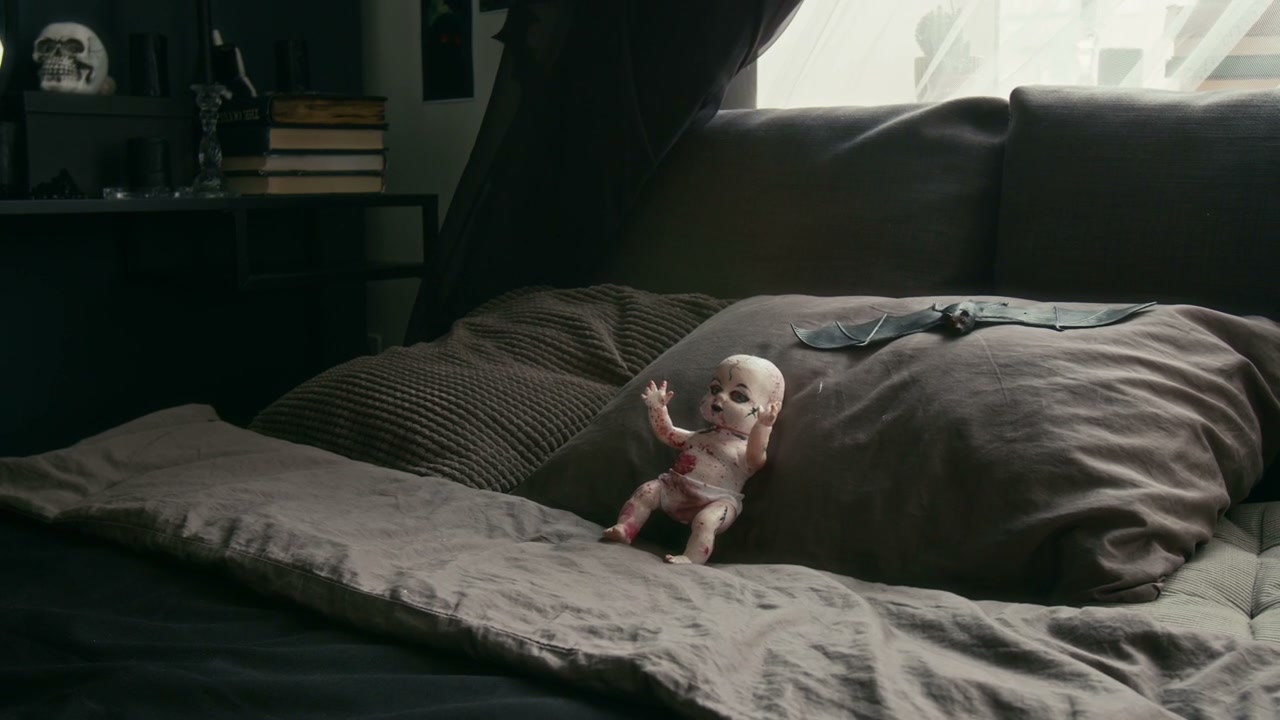 Creepy Doll on Bed in Gothic Bedroom