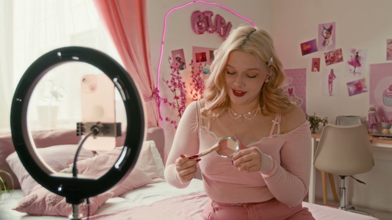 Blonde Woman Recording Makeup Tutorial