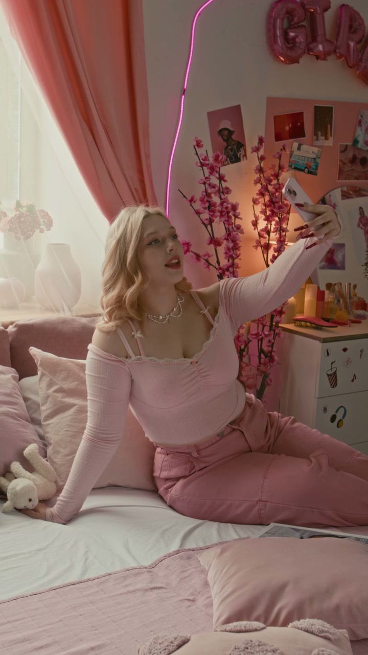 Girl Taking Selfie in Pink Aesthetic Bedroom