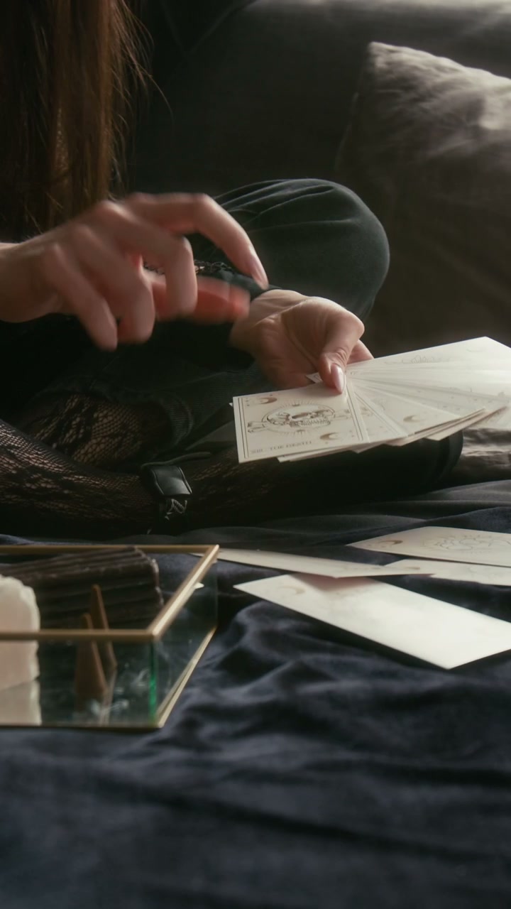 Gothic Person Reading Tarot Cards