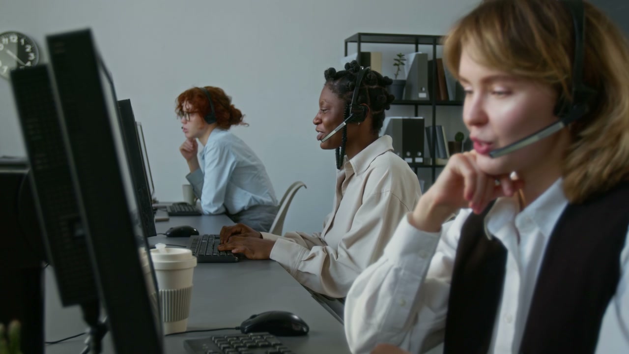 Diverse Customer Service Team Working in Office