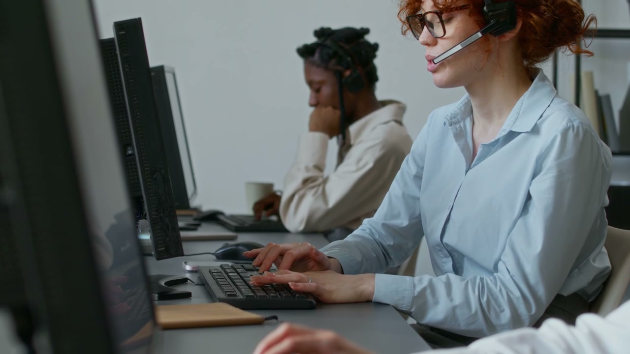Call Center Team Working in Modern Office