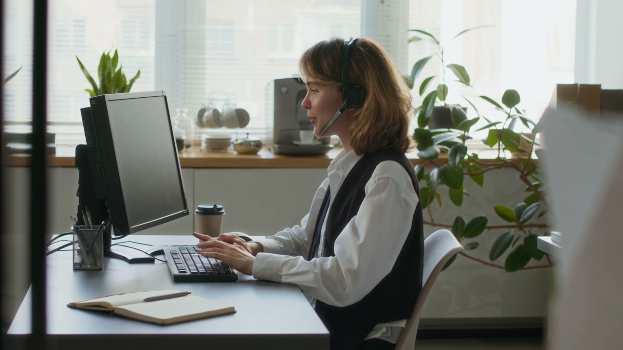 Call Center Agent Working in Office