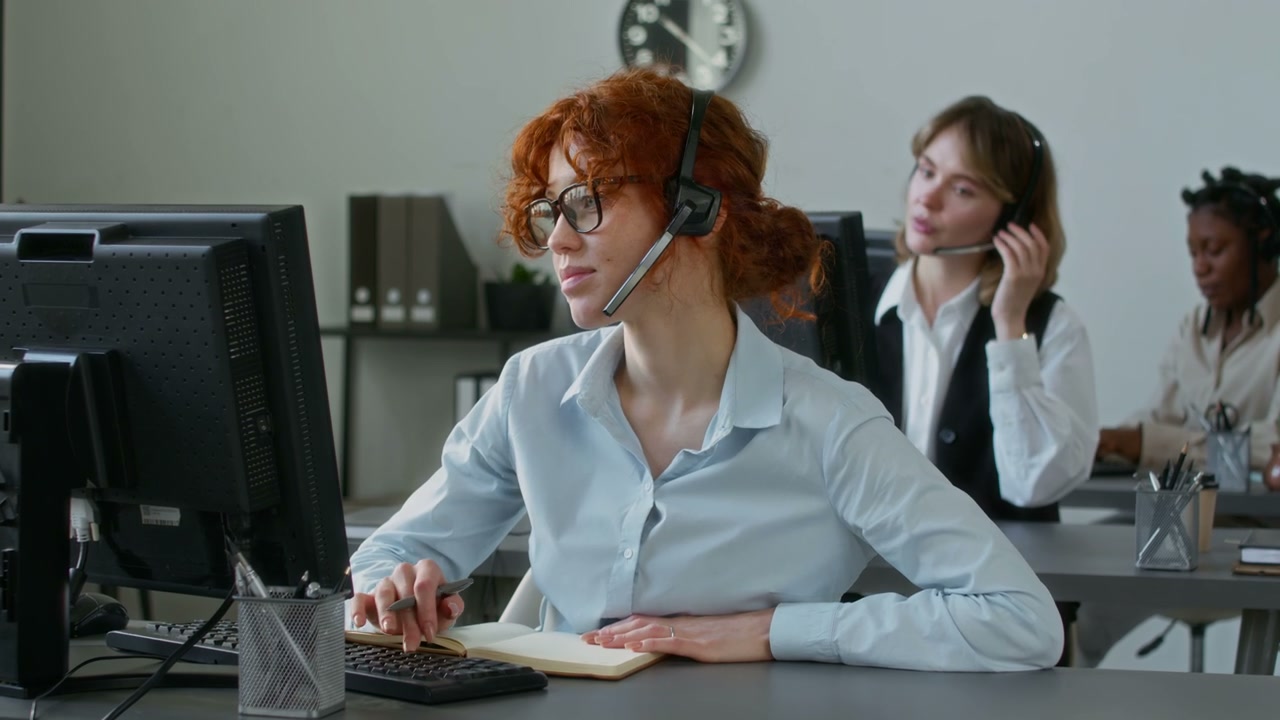 Call Center Agent Smiling at Camera