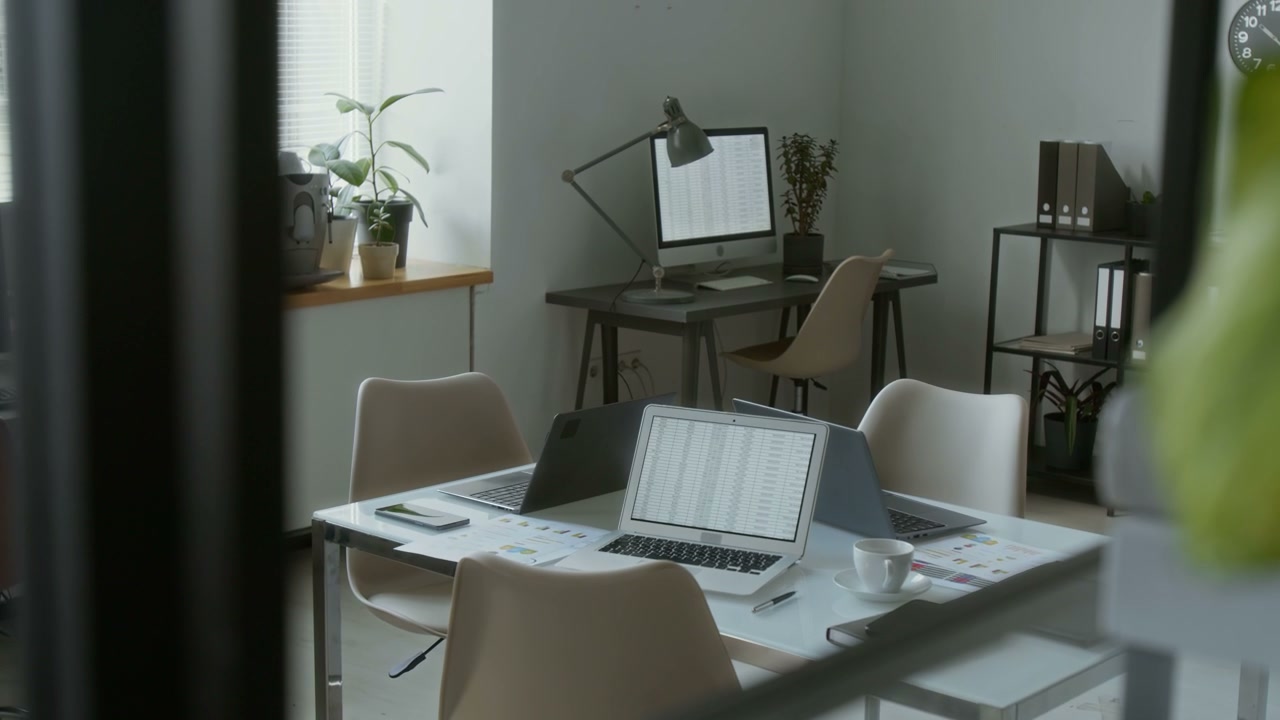 Corporate Office Interior with Laptops on Desk