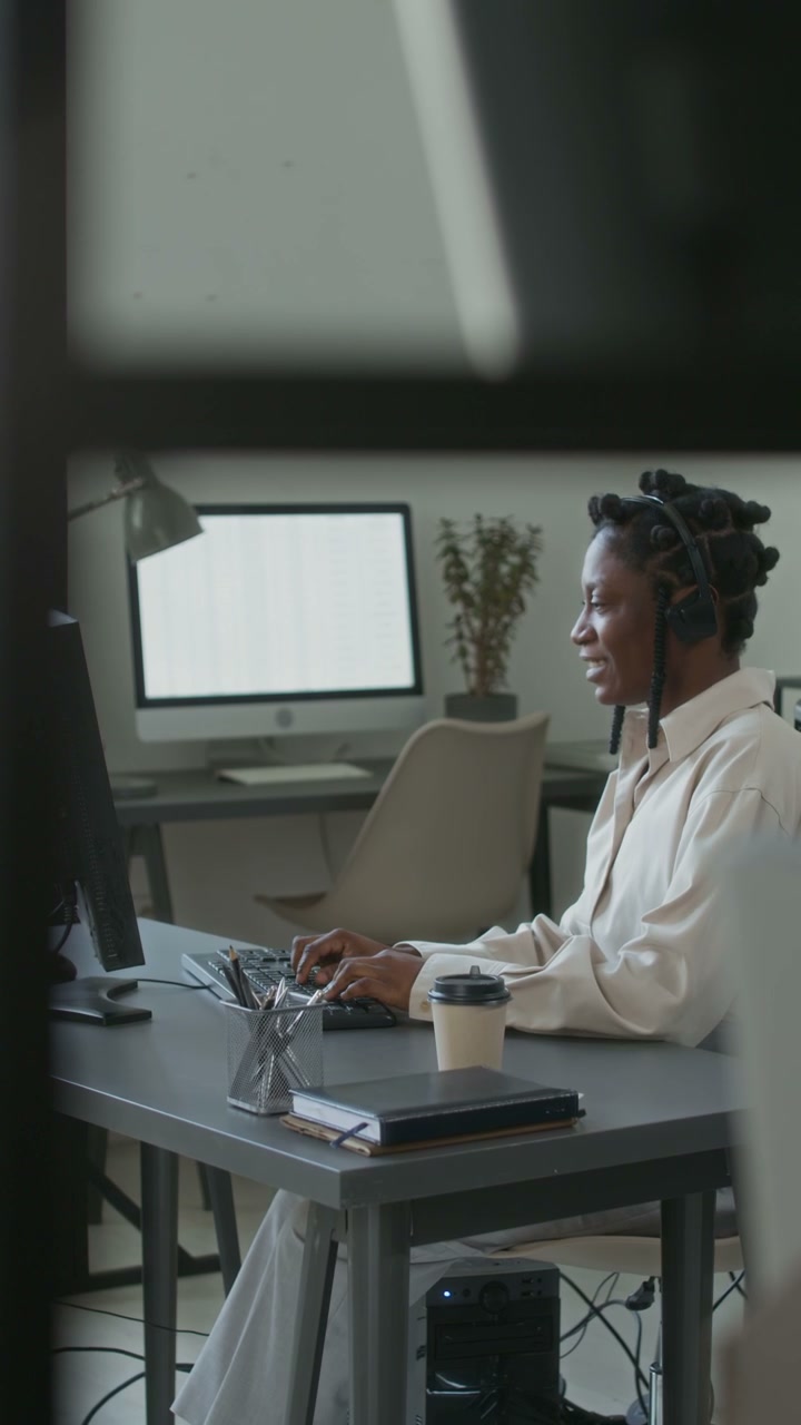 Woman Working in Call Center with Headset