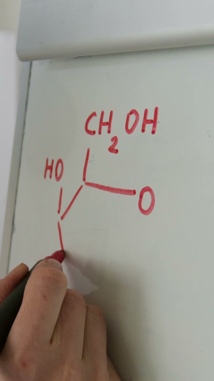 Hand Drawing Chemical Structure on Whiteboard