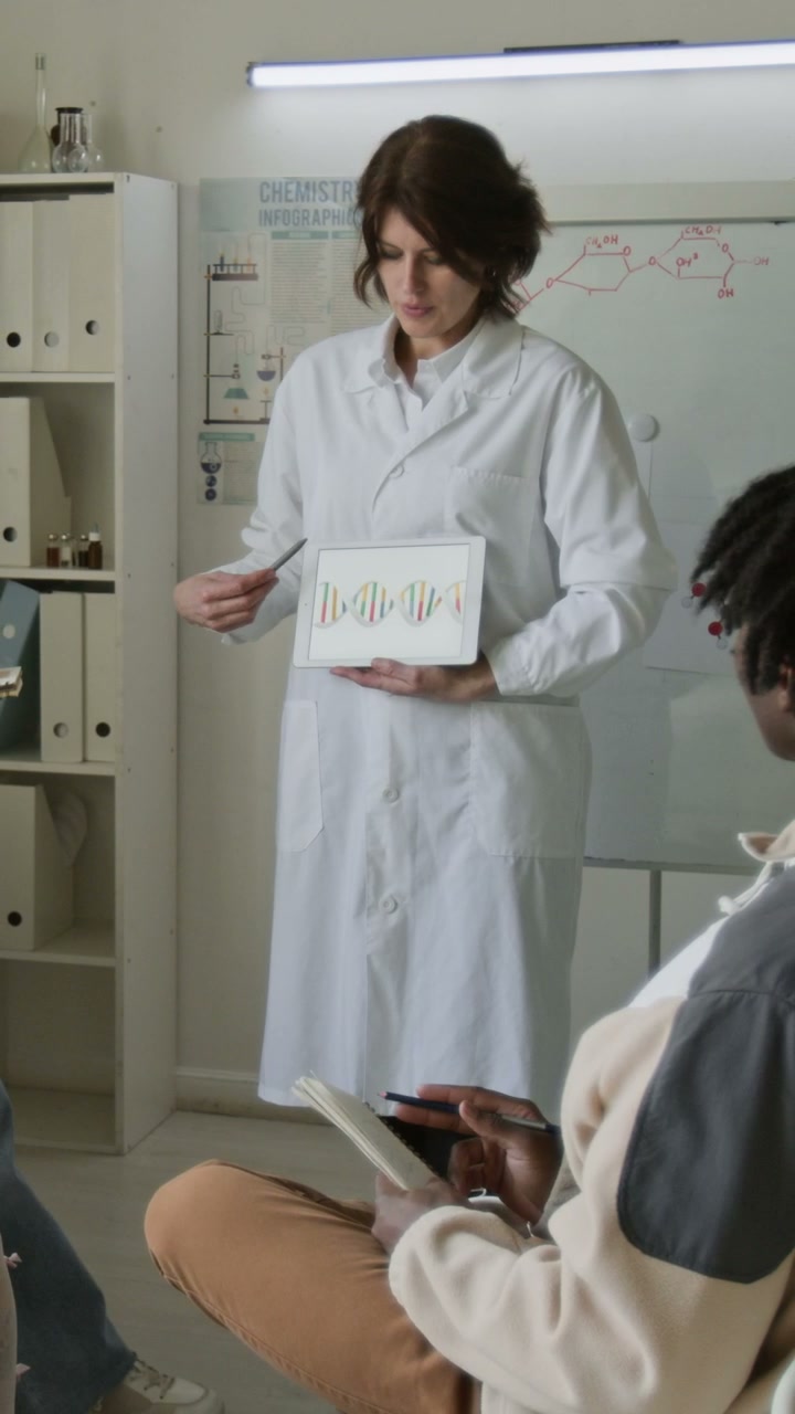 Science Teacher Explaining DNA