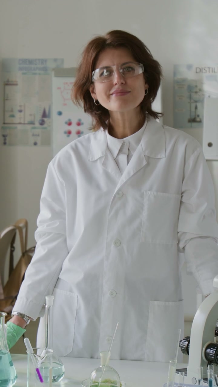 Female Scientist Smiling in Lab