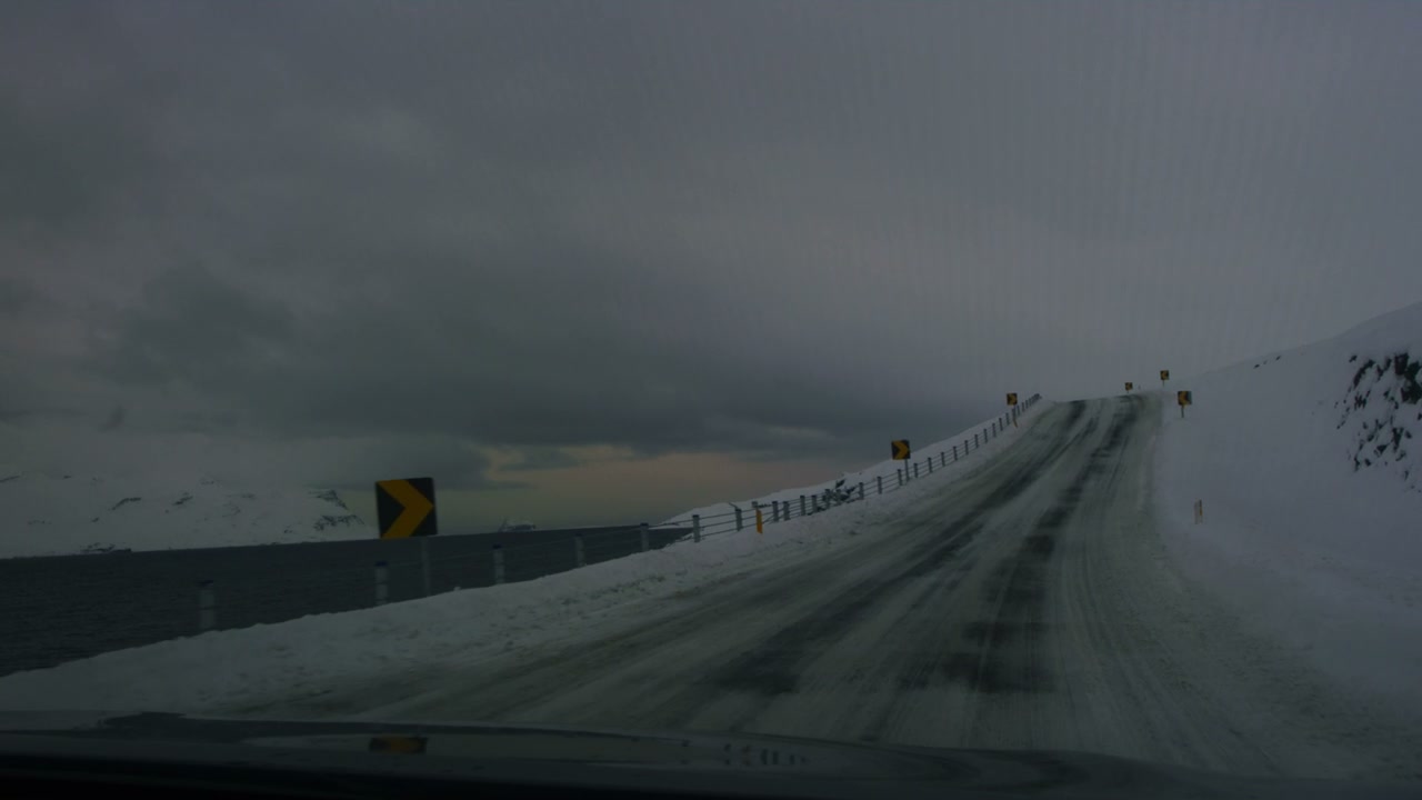 Snowy Road Drive Along Icy Coast