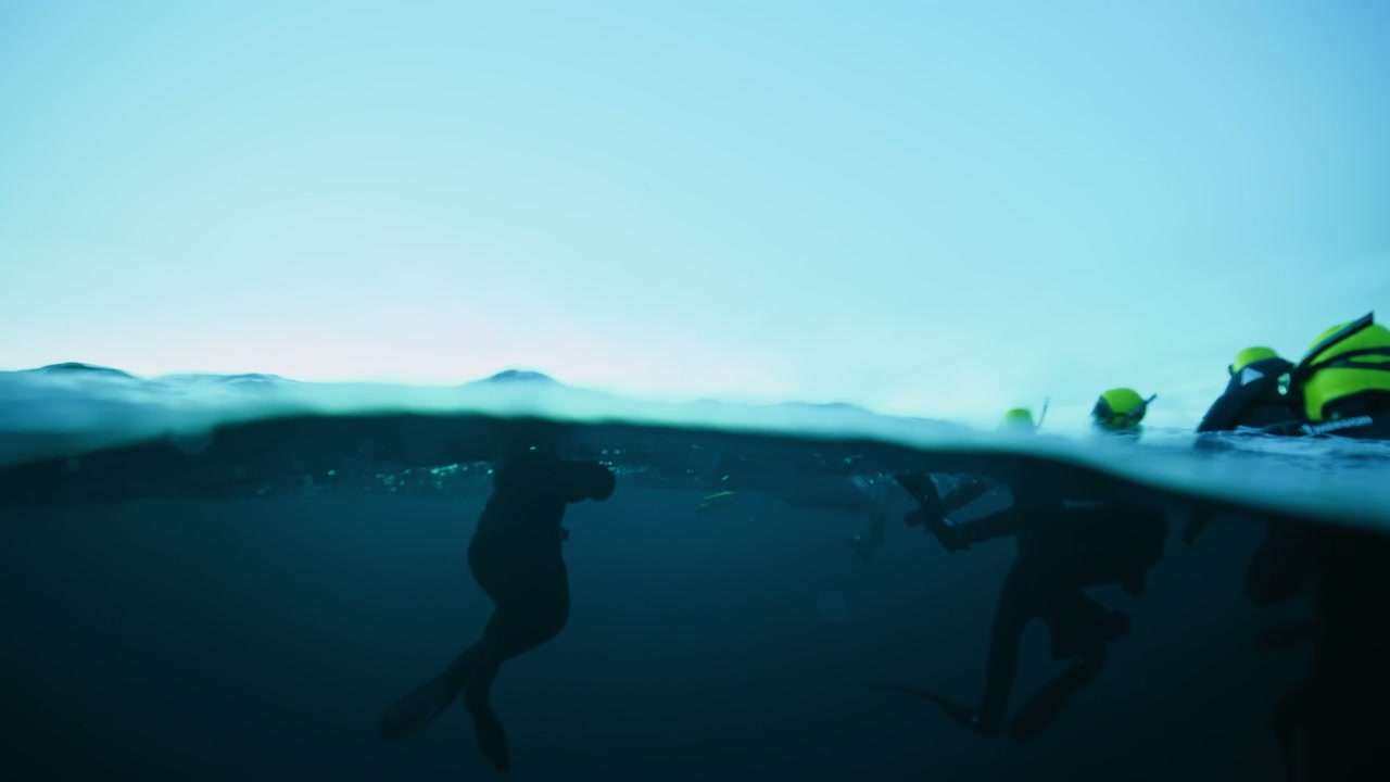 People Freediving in Arctic Ocean
