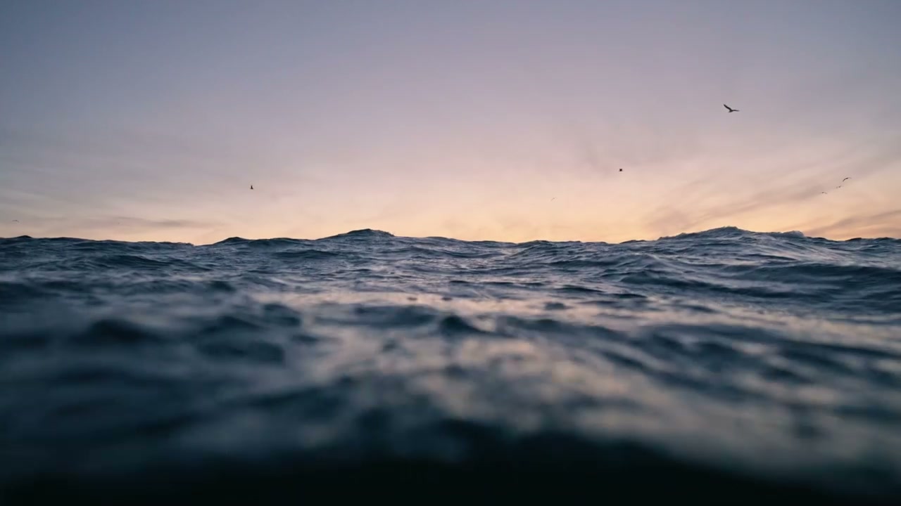 Over-Under Water Waves at Sunset
