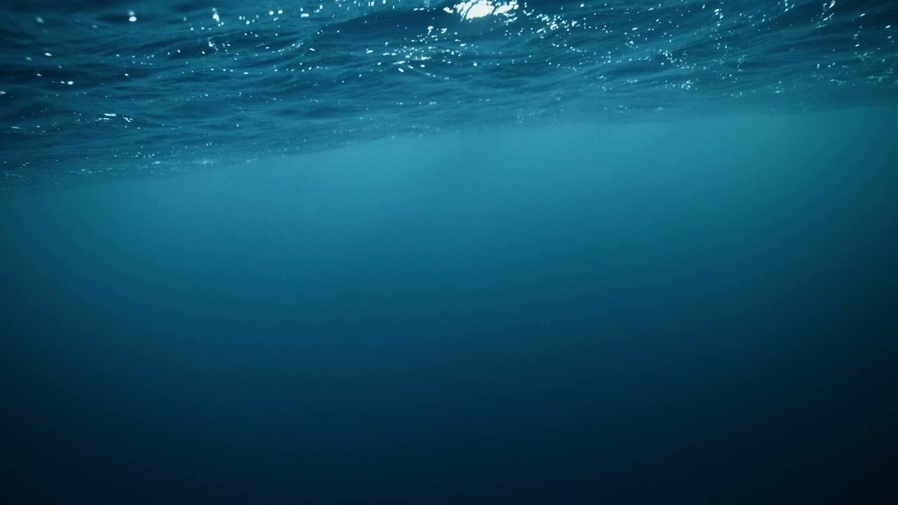 Underwater View of Deep Blue Ocean Waves