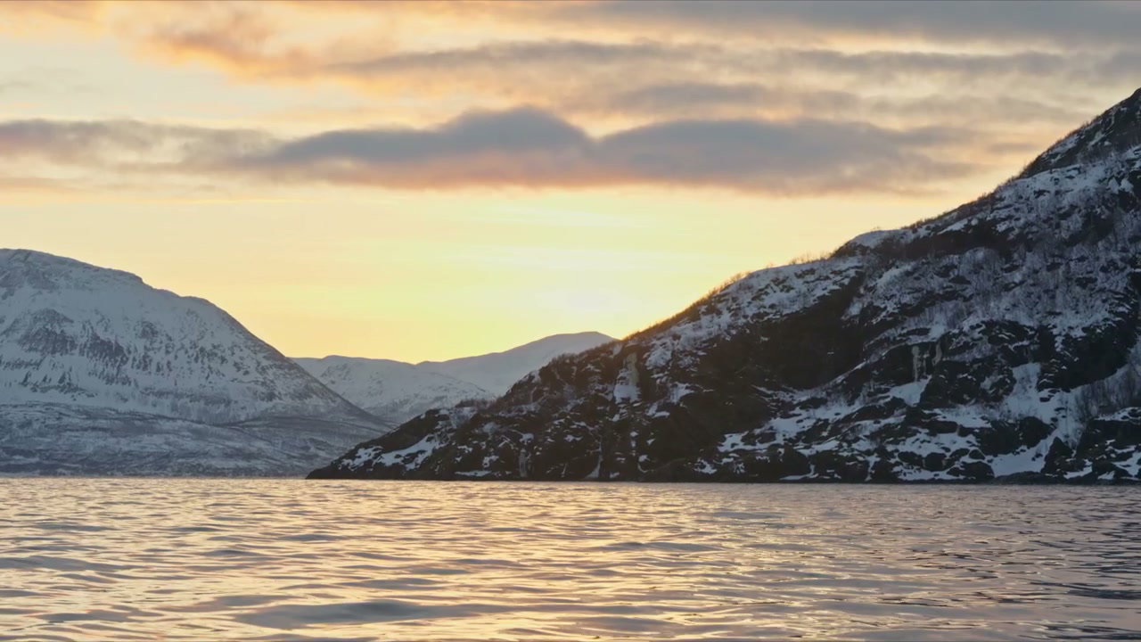 Arctic Fjord at Sunset with Snow Mountains