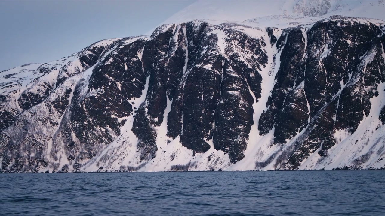 Snowy Mountains and Fjord in Arctic Norway