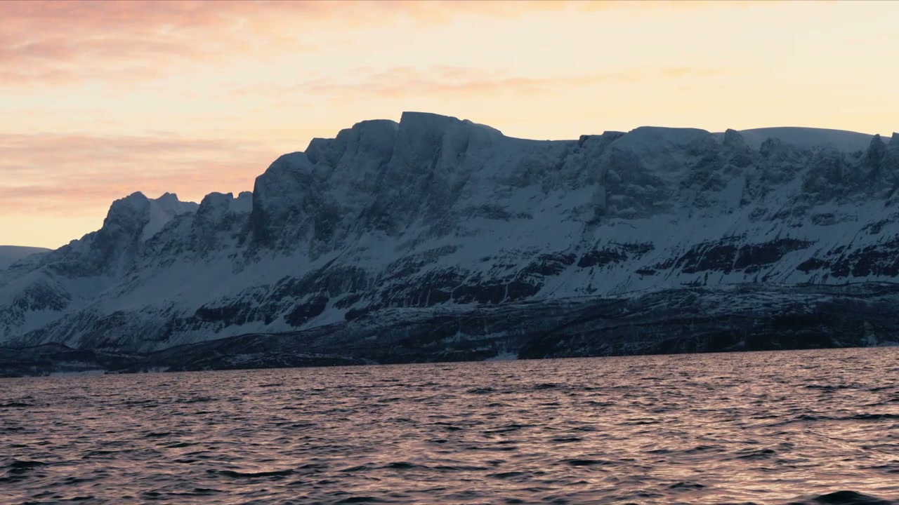 Arctic Fjord And Snowy Mountains At Sunset