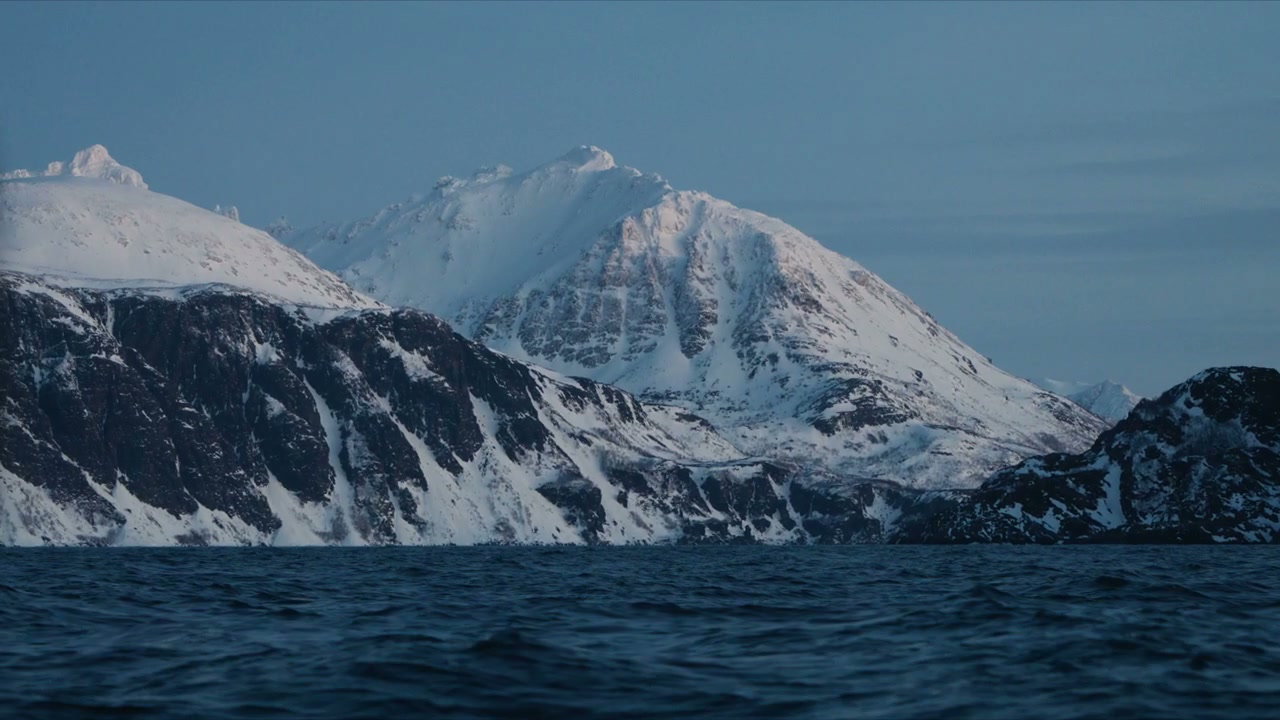 Snowy Mountains and Fjord in Arctic Norway