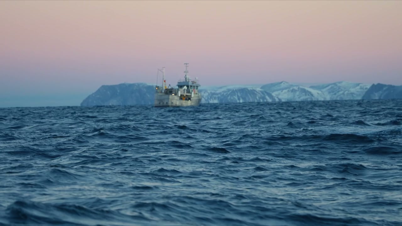 Fishing Boat on Rough Arctic Sea at Dawn