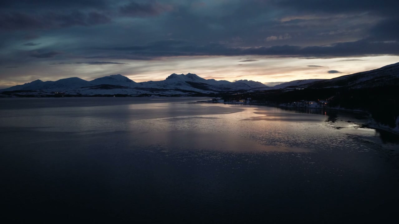 Arctic Fjord at Twilight with Cars on Bridge