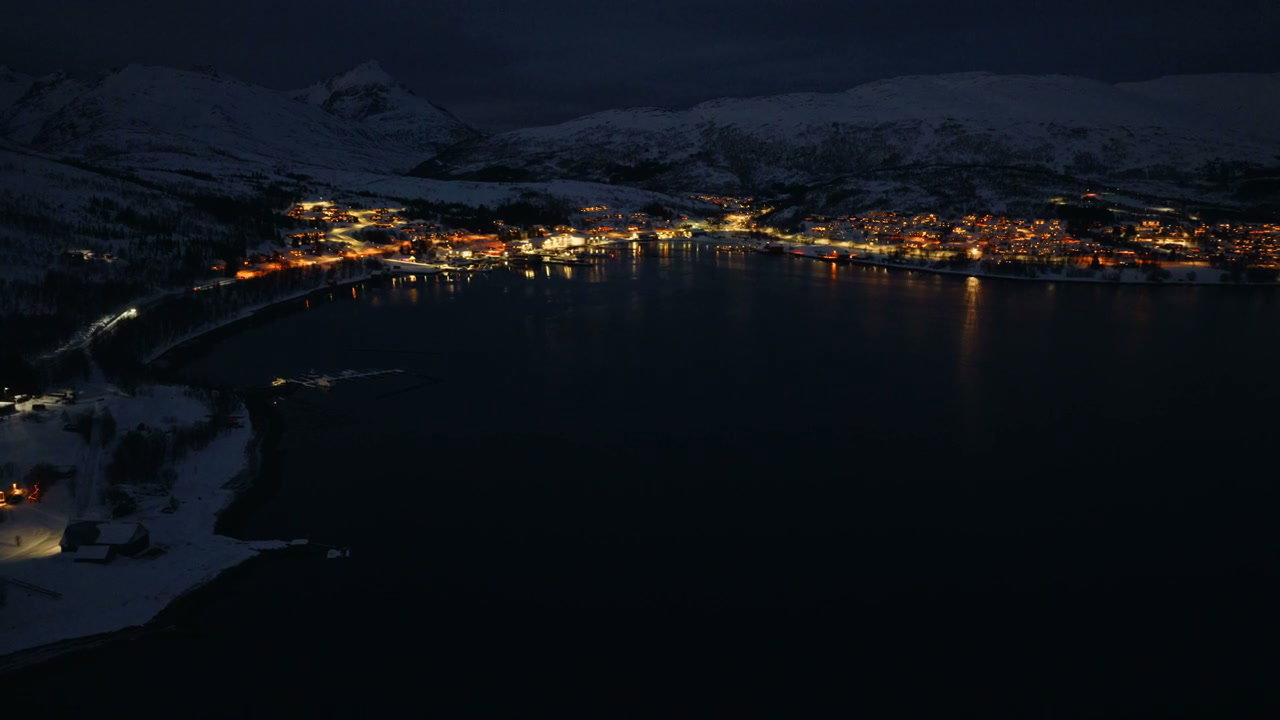 Norwegian Arctic Town by Fjord at Night