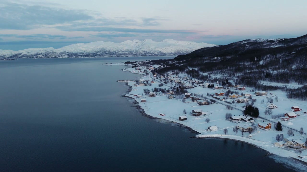 Snowy Norwegian Fjord Village