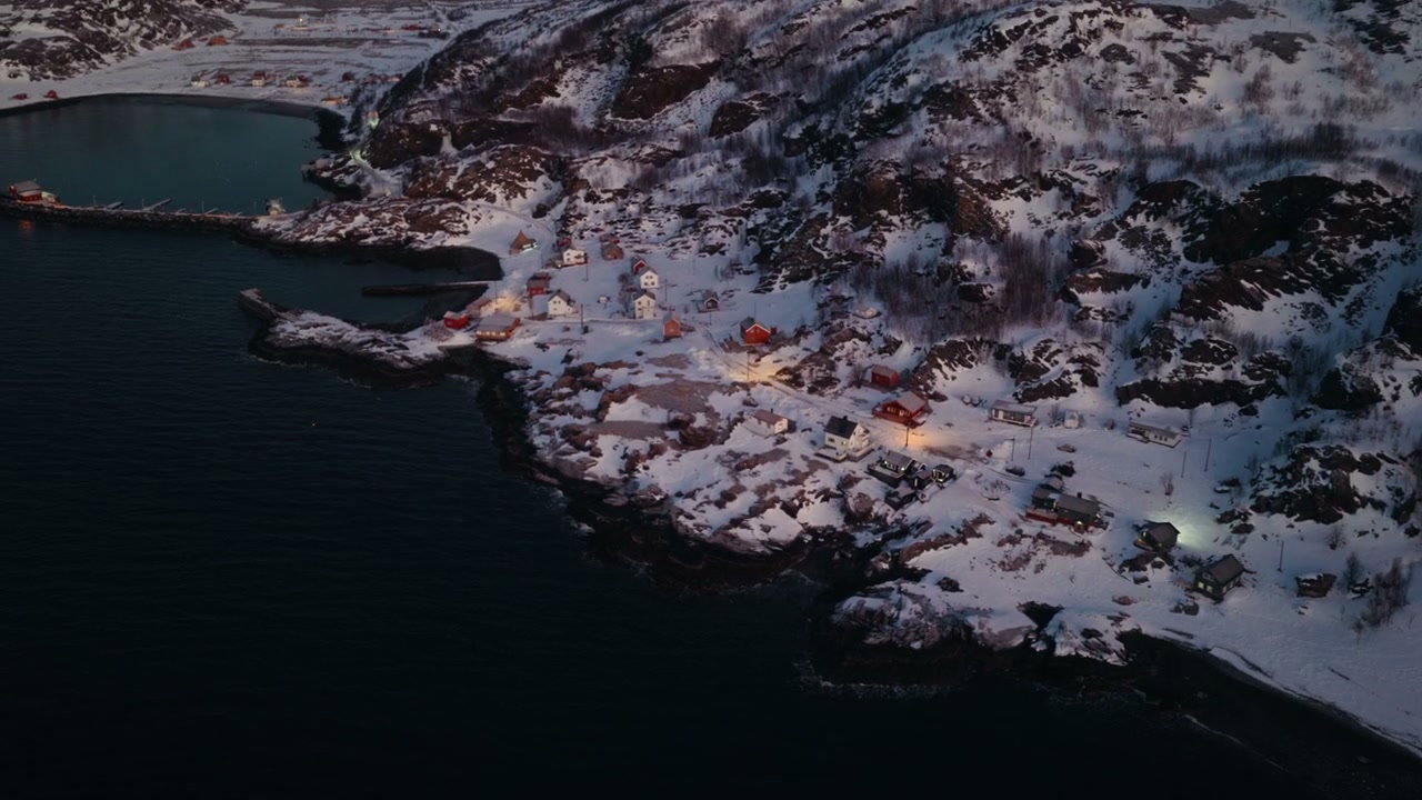 Snowy Norwegian Coastal Village at Dusk