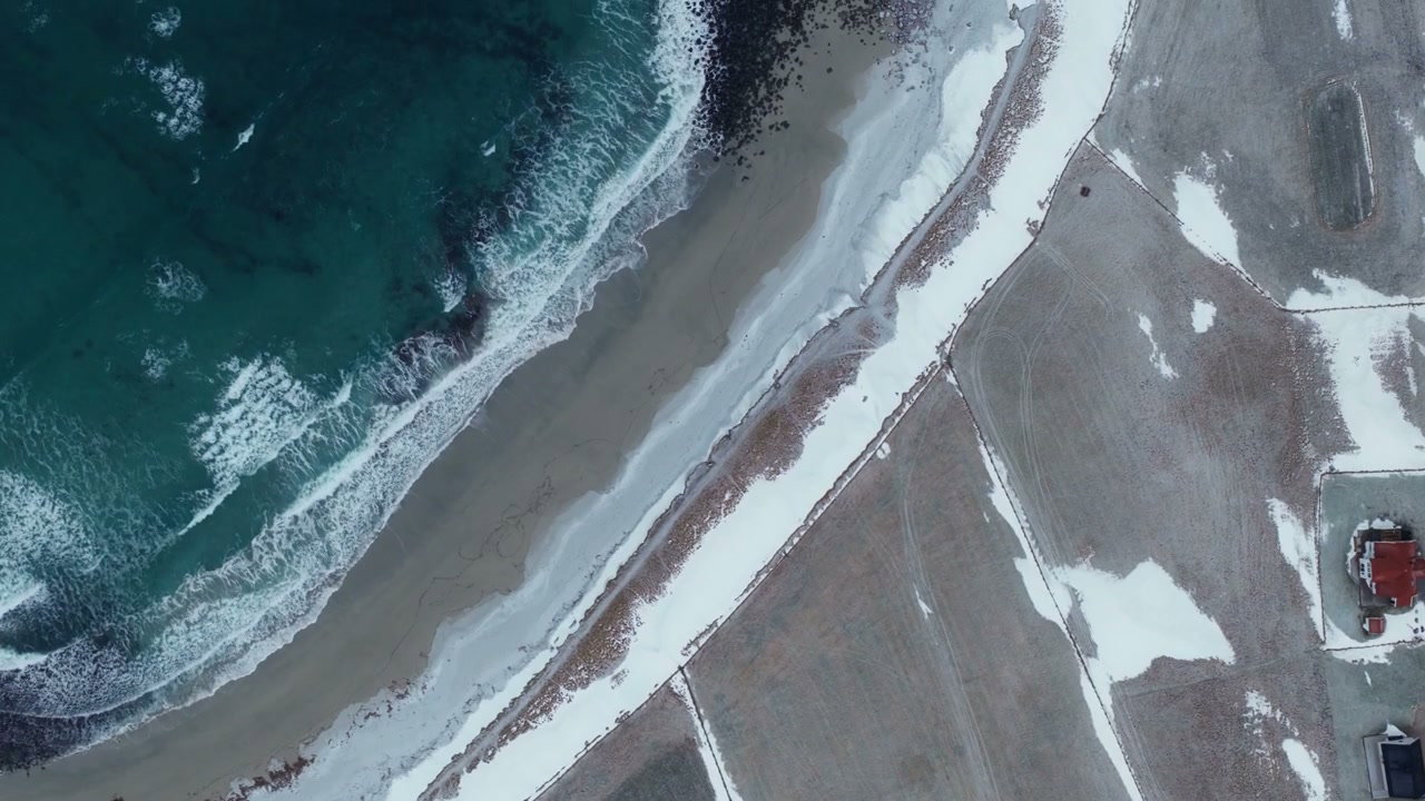 Snowy Coastline and Turquoise Ocean