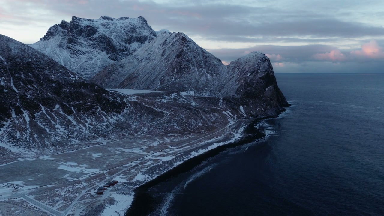 Snowy Arctic Coastline and Ocean in Norway