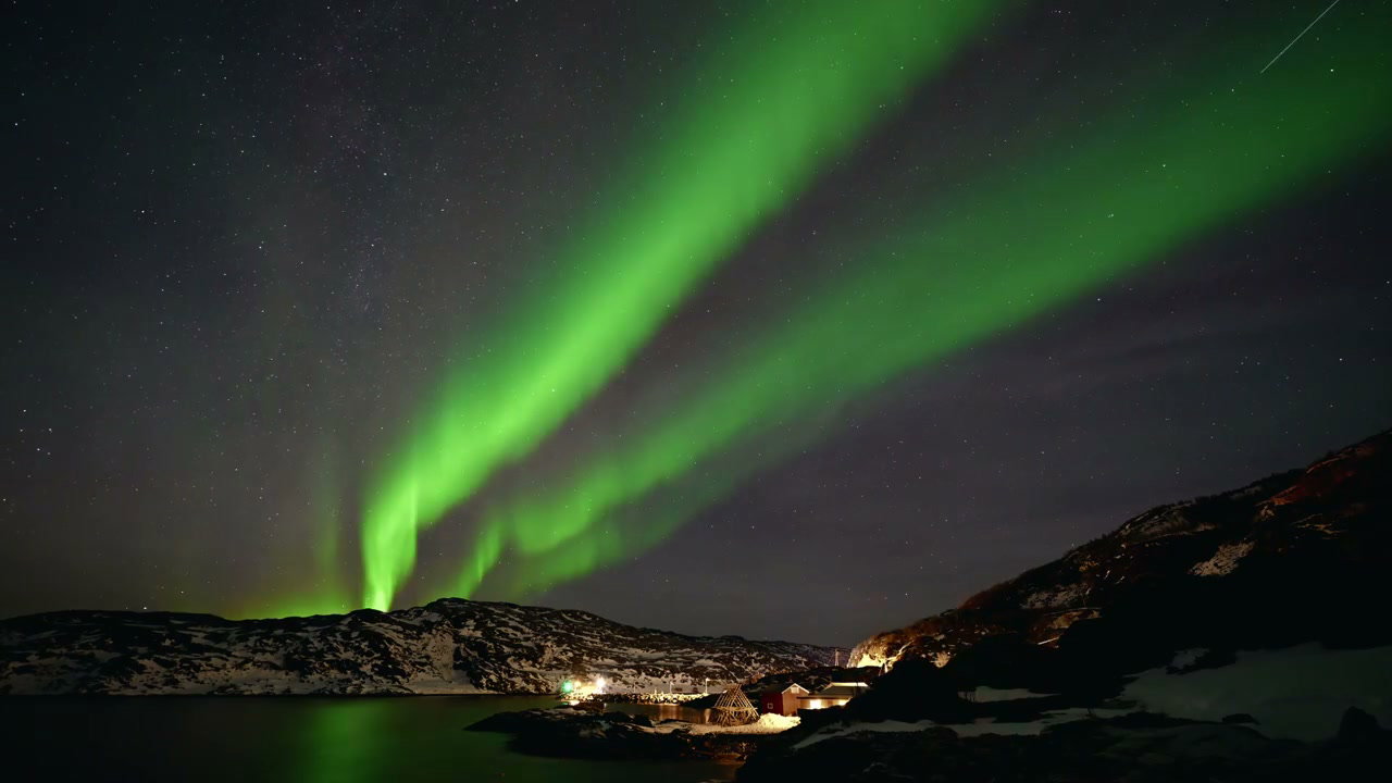 Northern Lights Over Arctic Village in Norway