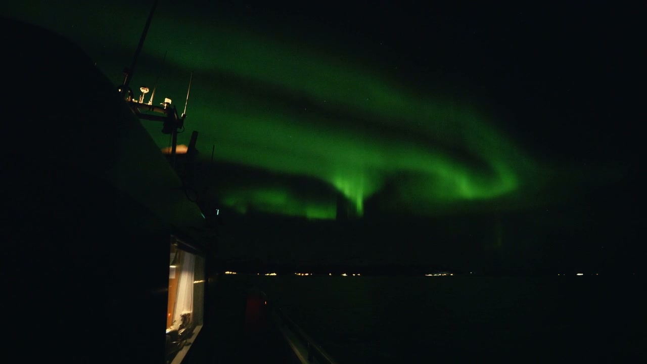 Northern Lights Over Arctic Sea From Boat