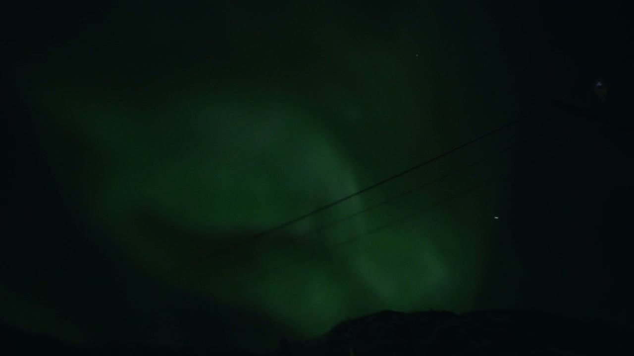 Aurora Borealis Over Arctic Winter Landscape