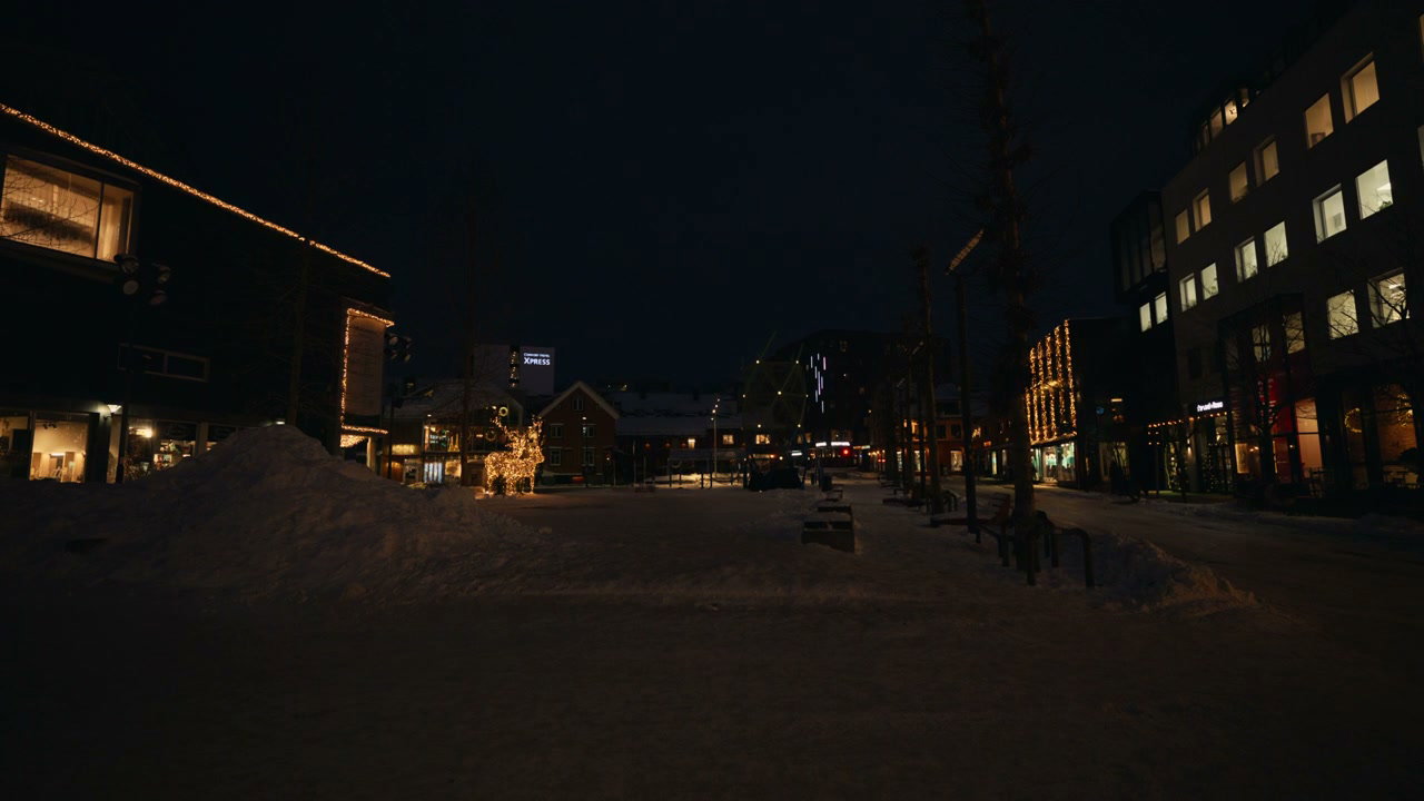 Christmas Lights Adorn Snowy Town Square