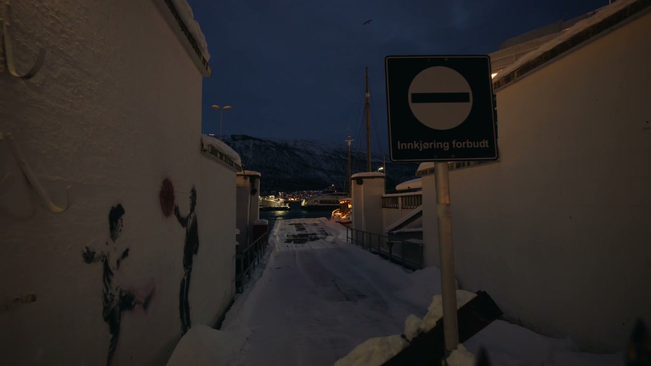 Snowy Alleyway with Graffiti in Arctic Norway