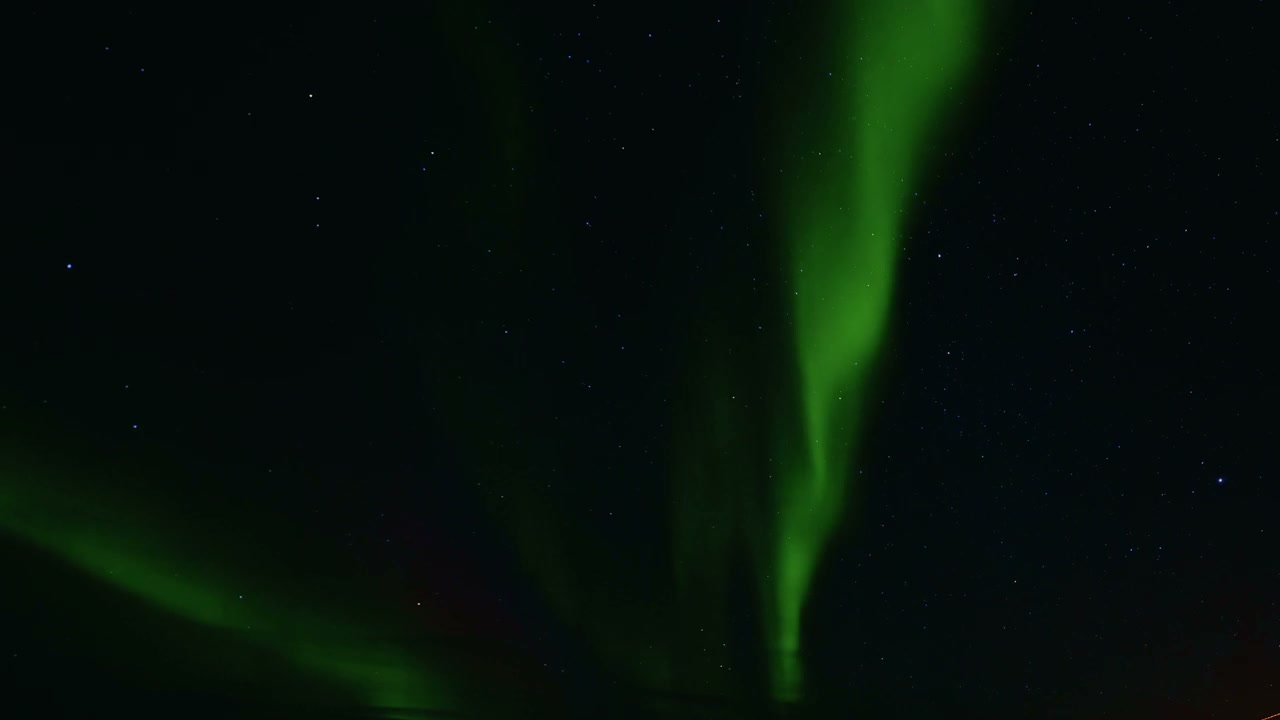Aurora Borealis in Dark Arctic Sky