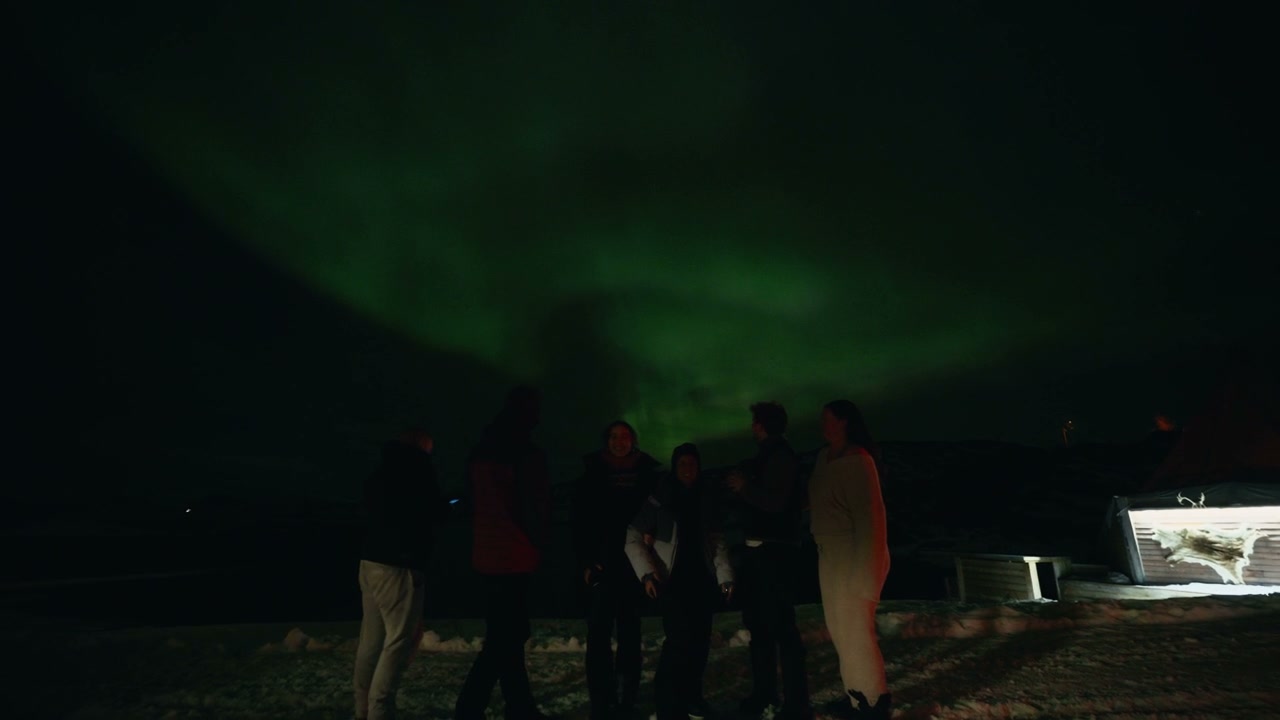 Group Watching Northern Lights in Norway