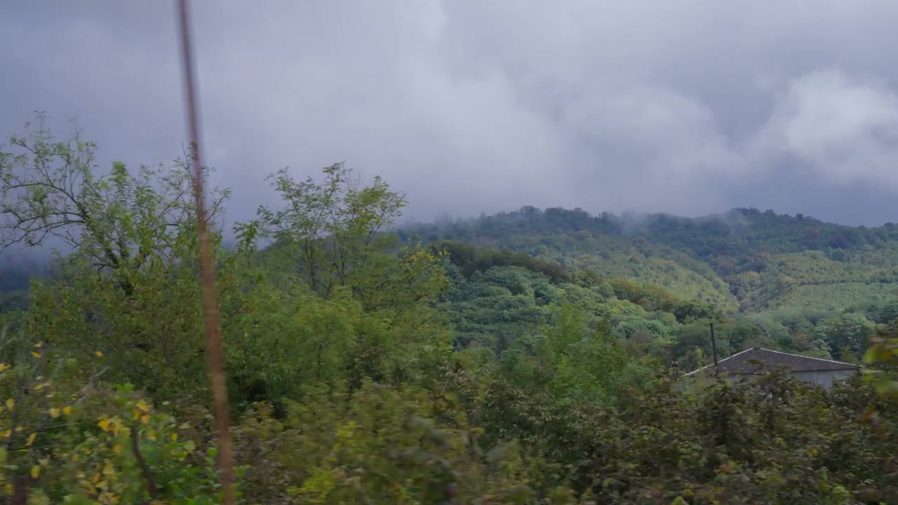 POV of Rural House on Misty Mountainside
