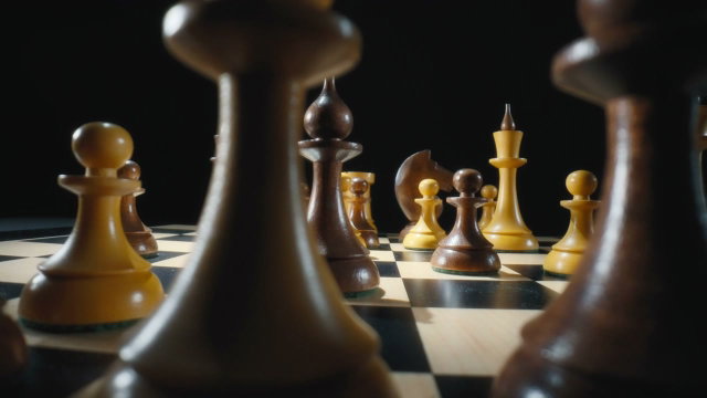 White Chess Pieces on Chessboard Ready to Play • Stock Video on Uppbeat