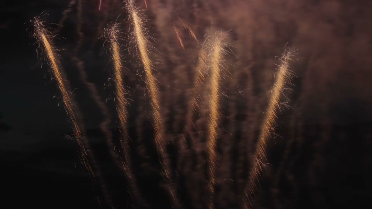 Vivid Fireworks Exploding Over Water at Night • Stock Video on Uppbeat