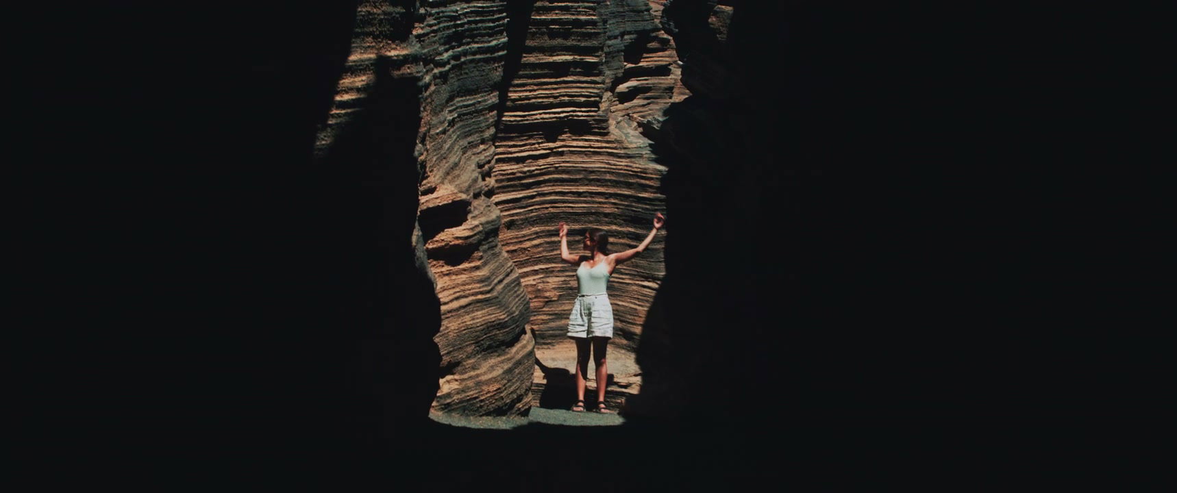 Person in Layered Canyon