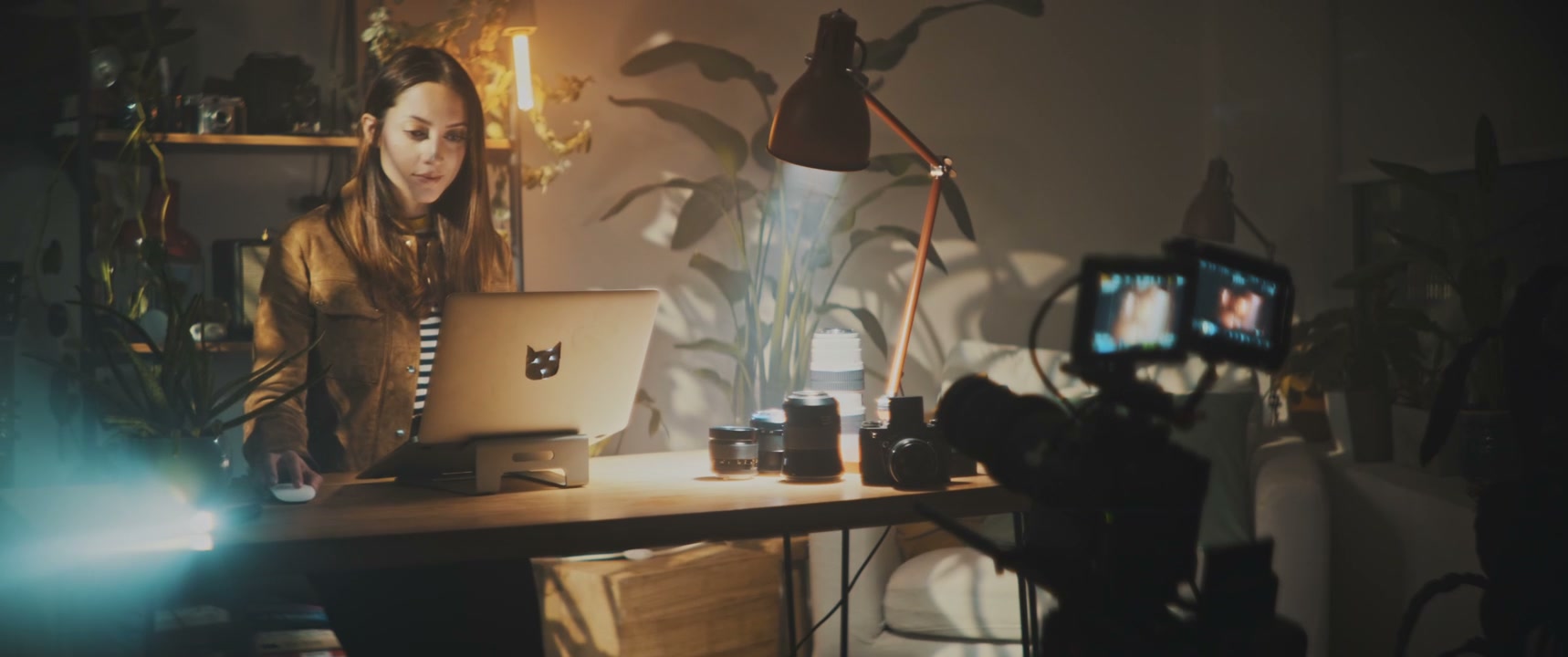 Female Filmmaker Working on Laptop