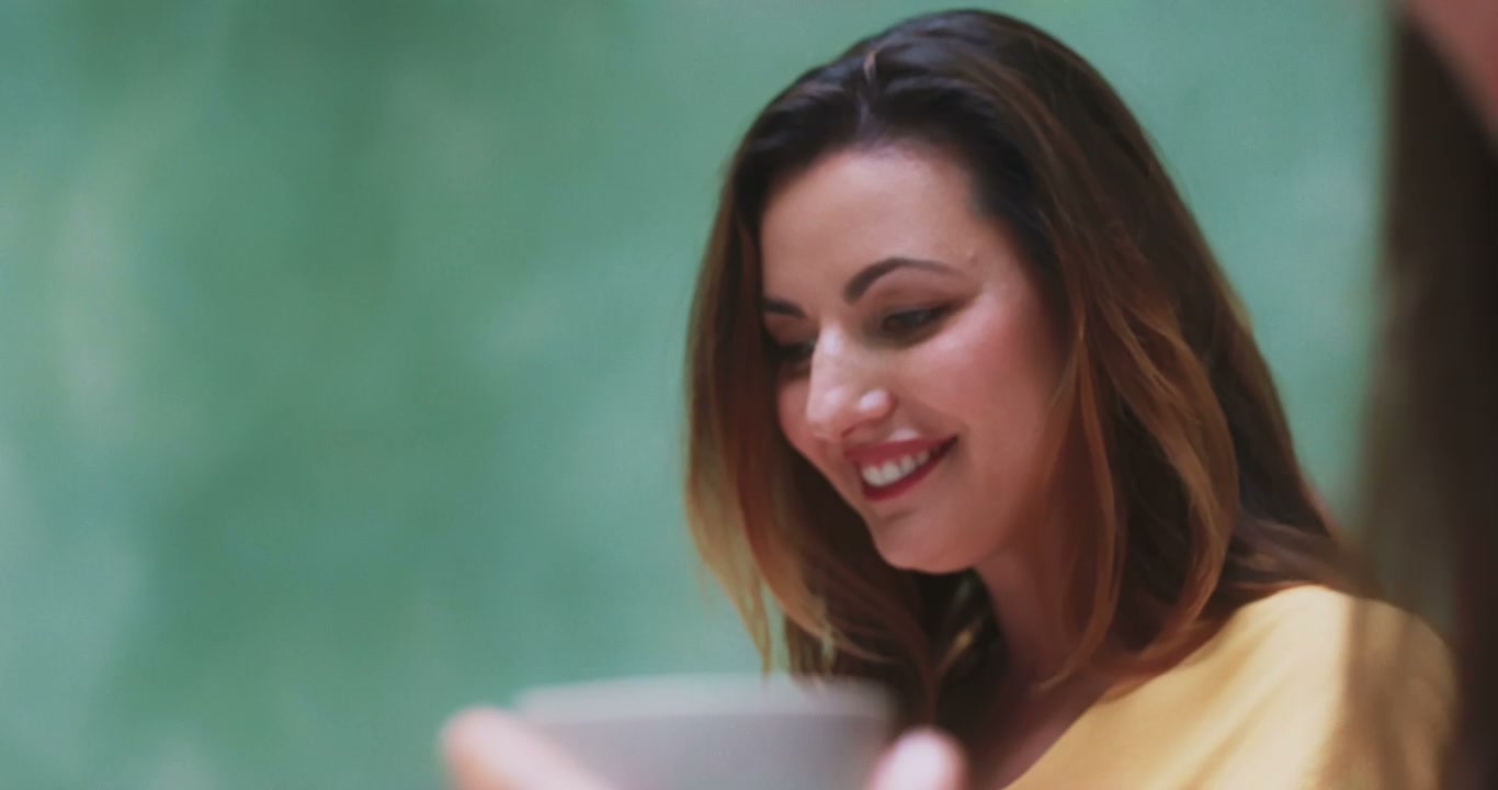 Woman Smiling at Tea Ceremony